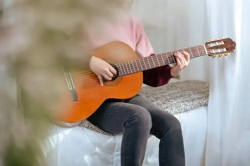 林志炫《凤凰花开的路口吉他谱》-G调-玩易吉他
