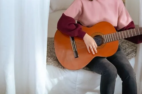 林志炫《凤凰花开的路口吉他谱》-G调-玩易吉他